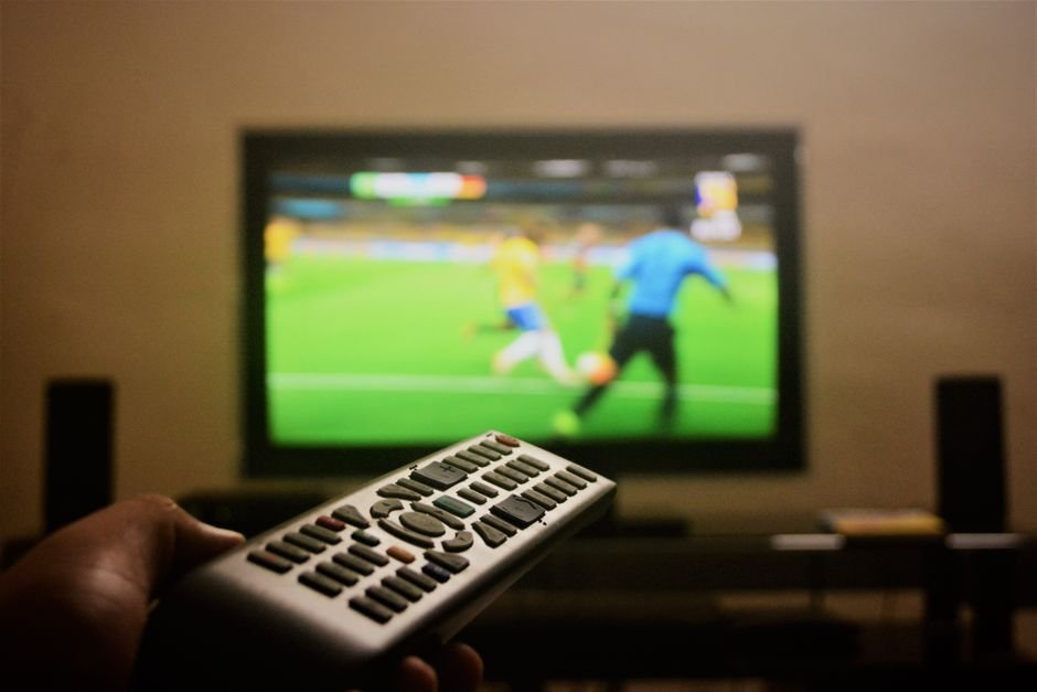 UK viewer watching premium IPTV service on 4K television in modern living room